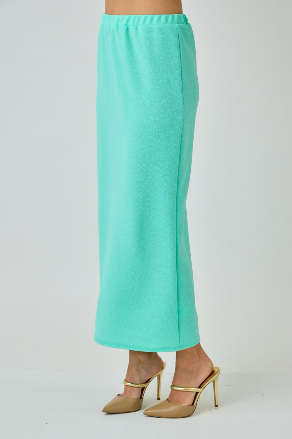 Aqua mint ladies maxi length pencil skirt by Celeste Clothing, fitted style with smooth fabric and high waist design.