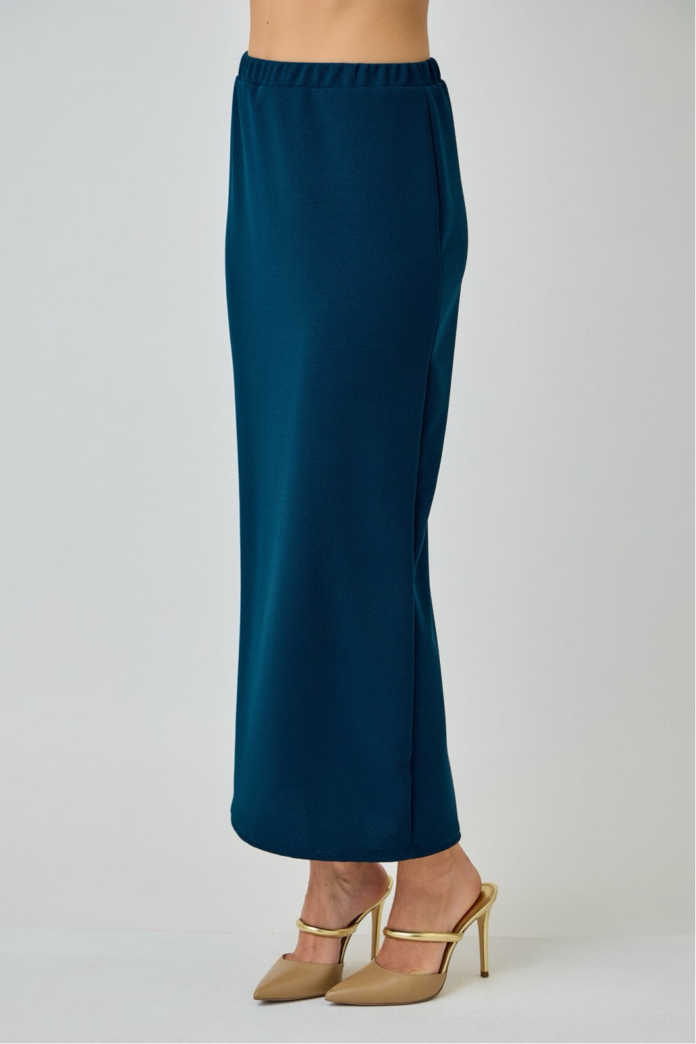 Teal ladies maxi length pencil skirt by Celeste Clothing, featuring a fitted design and sleek silhouette.