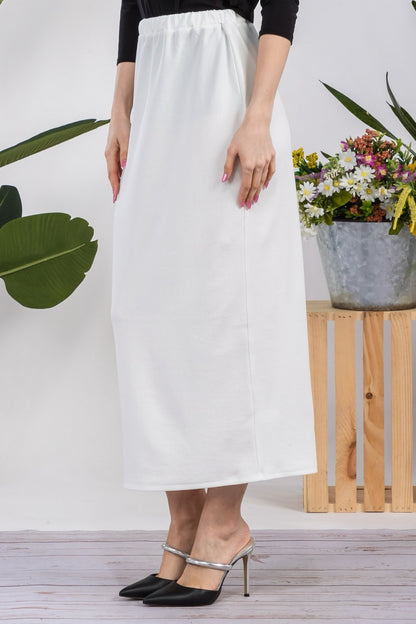 White ladies maxi length pencil skirt by Celeste Clothing, featuring a fitted design and elegant style.
