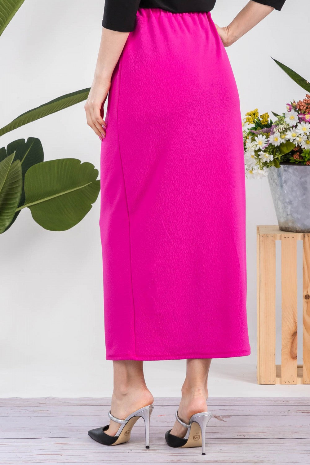 Pink ladies maxi length pencil skirt by Celeste Clothing, showcasing a fitted silhouette and elegant design.