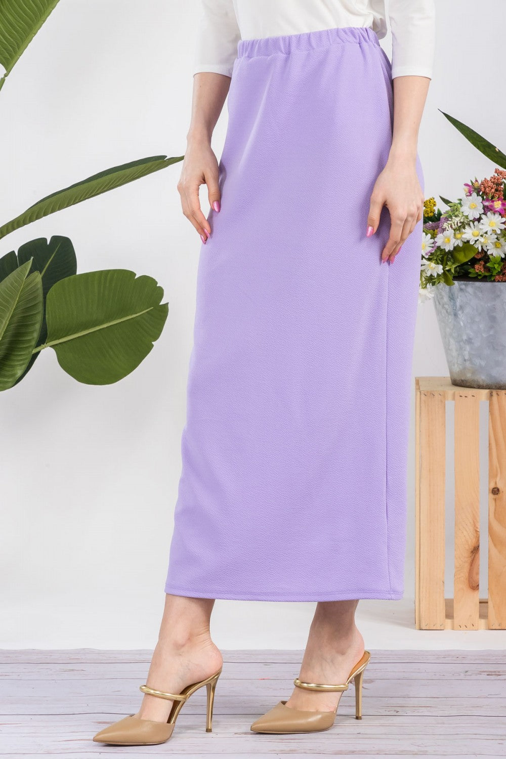 Pink ladies maxi length pencil skirt from Celeste Clothing, showcasing a fitted design and elegant style.