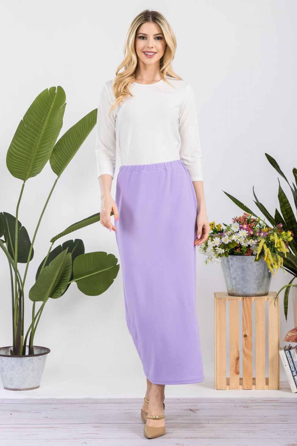 Pink ladies maxi length pencil skirt from Celeste Clothing, featuring a sleek and fitted design perfect for elegant style.