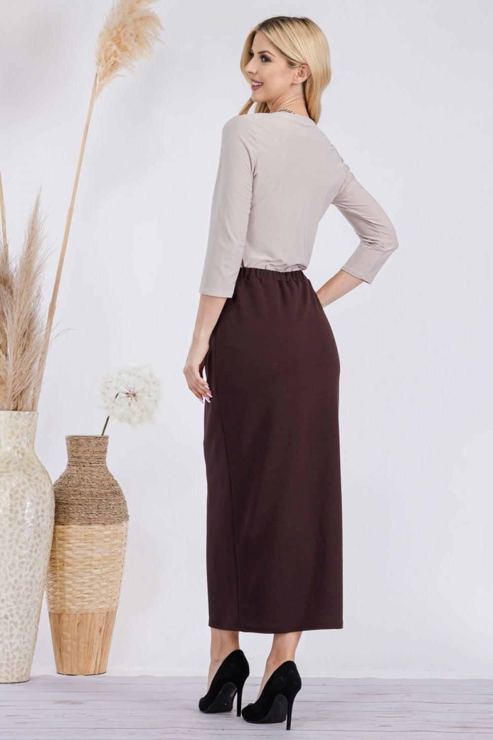 Pink ladies maxi-length pencil skirt by Celeste Clothing, featuring a fitted design and elegant style.
