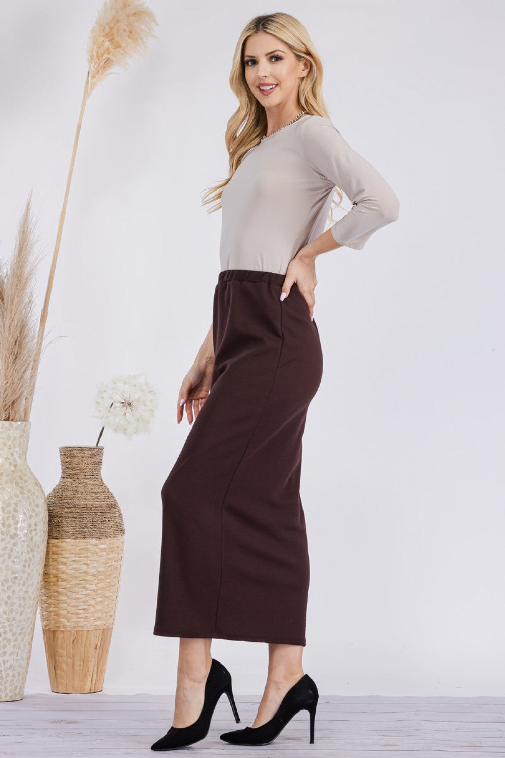 Pink ladies maxi-length pencil skirt by Celeste Clothing, showcasing a fitted design and elegant style for women.