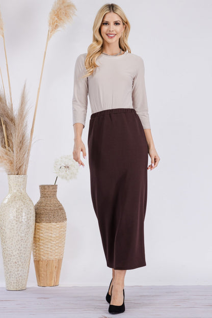 Pink ladies maxi length pencil skirt by Celeste Clothing, displayed on a model showing the fitted, elegant design.