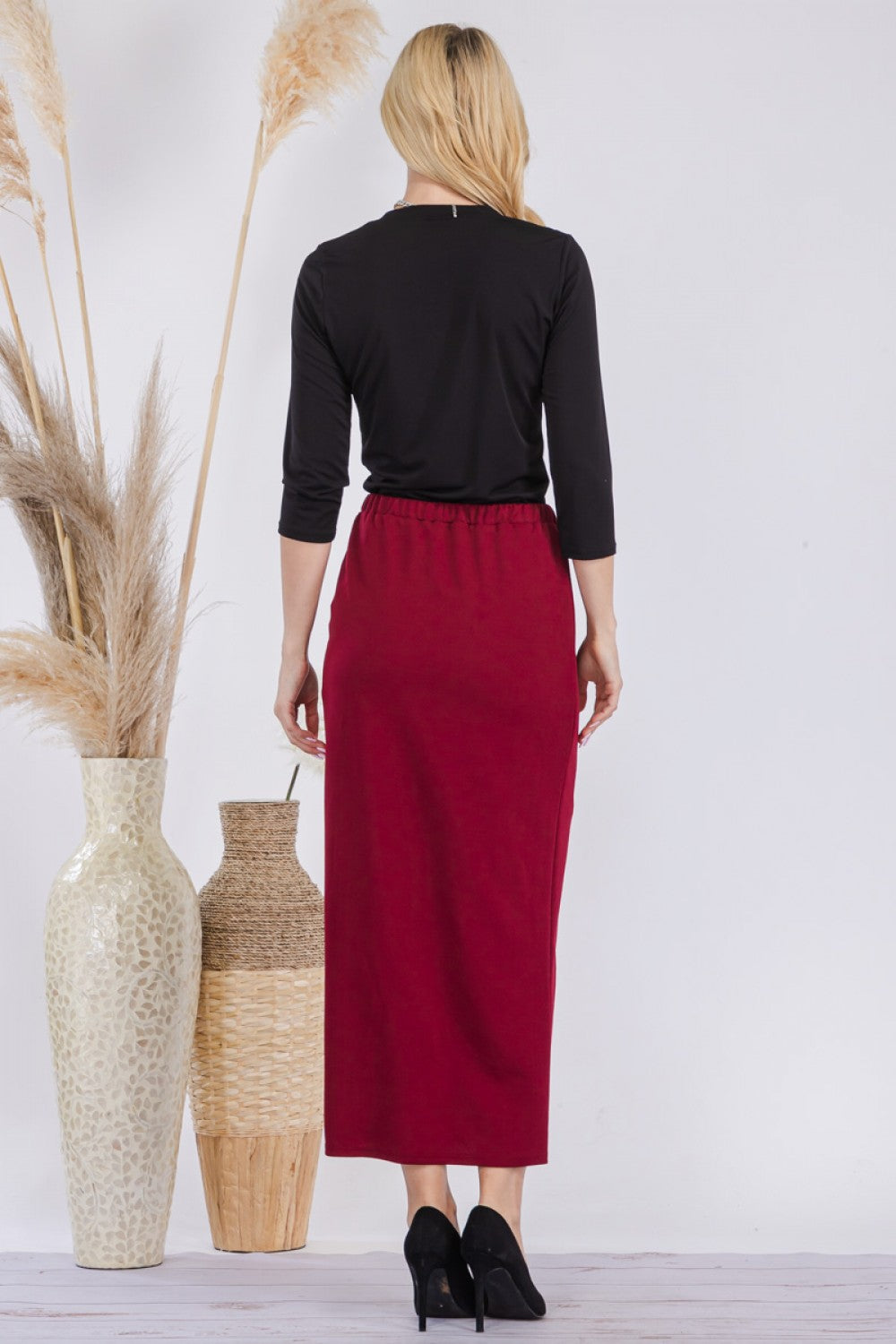 Pink ladies maxi length pencil skirt by Celeste Clothing, showcasing a fitted, elegant design for women.