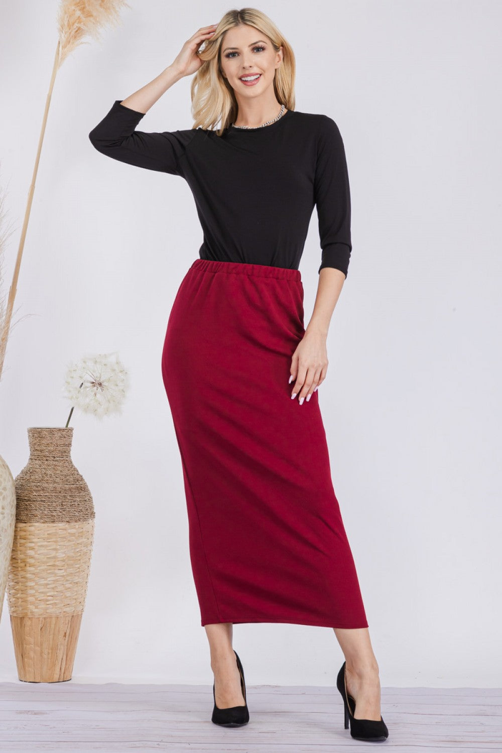 Pink ladies maxi length pencil skirt by Celeste Clothing, showing its fitted silhouette and elegant design.