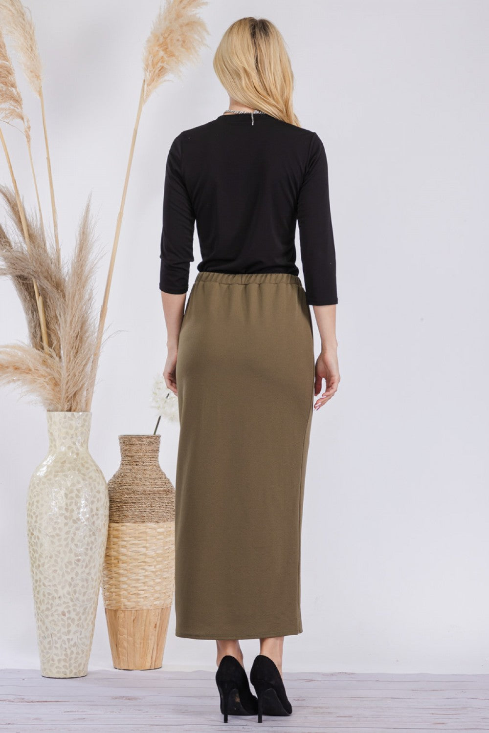 Pink ladies maxi-length pencil skirt by Celeste Clothing, flowing fabric and fitted silhouette for elegant style.