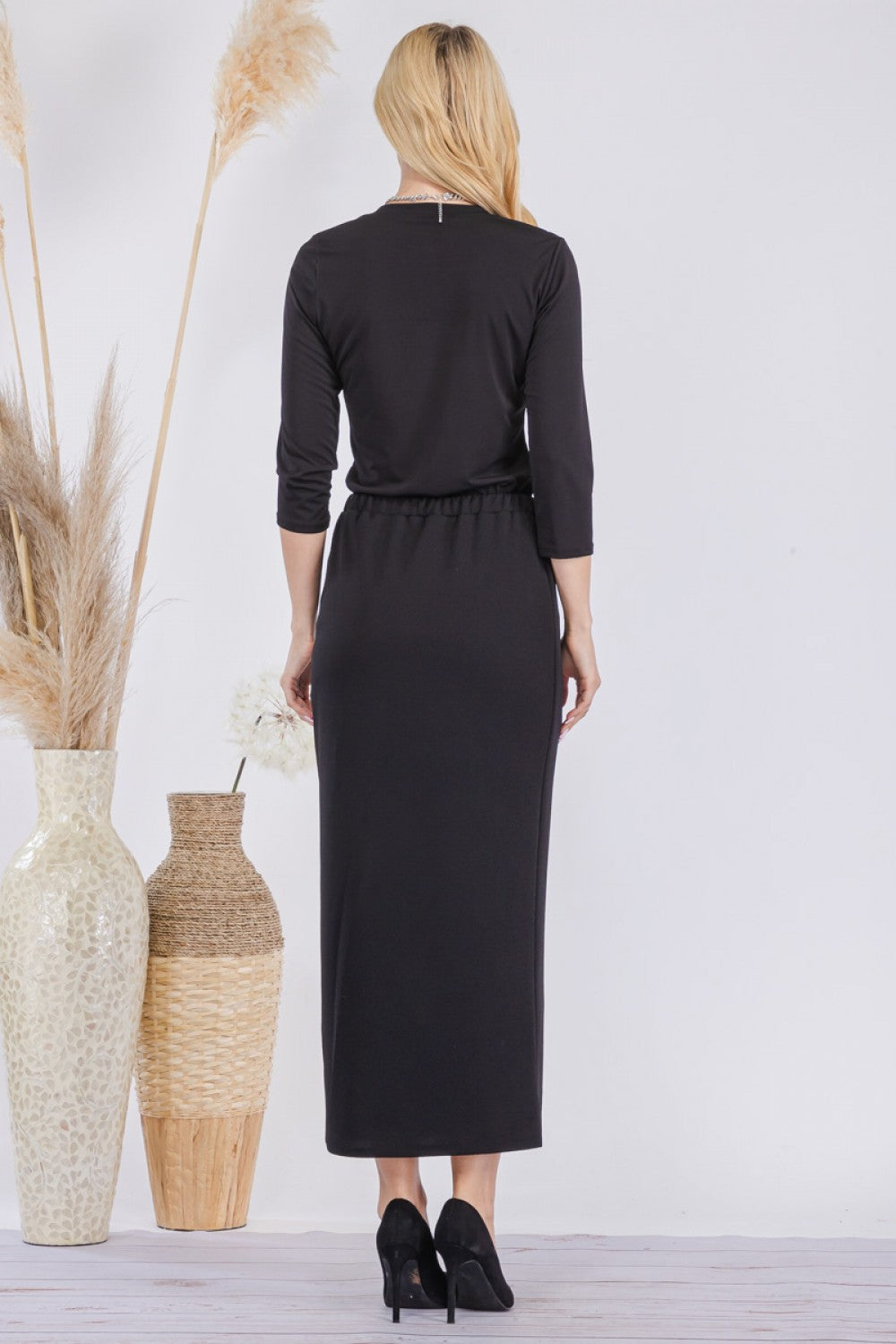 Pink ladies maxi-length pencil skirt by Celeste Clothing, featuring a sleek, fitted design and elegant style.