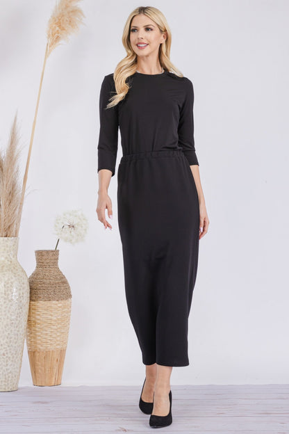 Pink ladies maxi length pencil skirt by Celeste Clothing, showing a fitted style and smooth fabric in a close-up view.