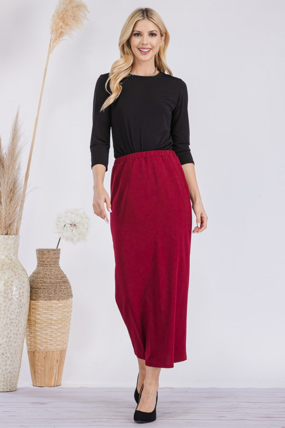 Pink ladies maxi length pencil skirt by Celeste Clothing, showcasing a fitted style and elegant design.