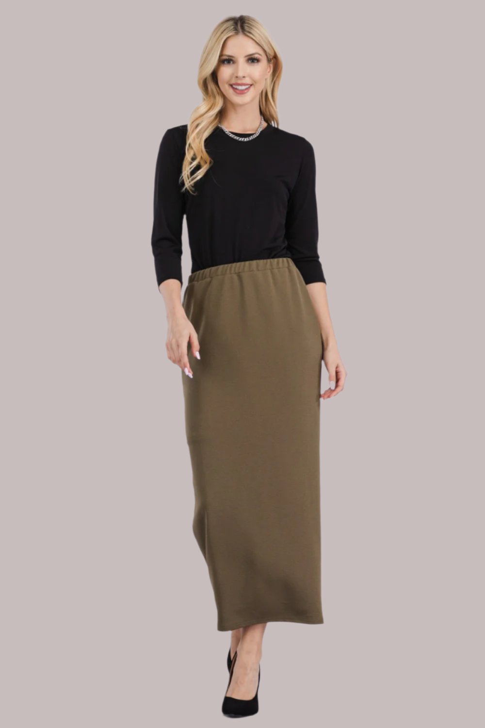 Pink ladies maxi length pencil skirt from Celeste Clothing, showcasing a sleek, fitted design ideal for elegant casual wear.