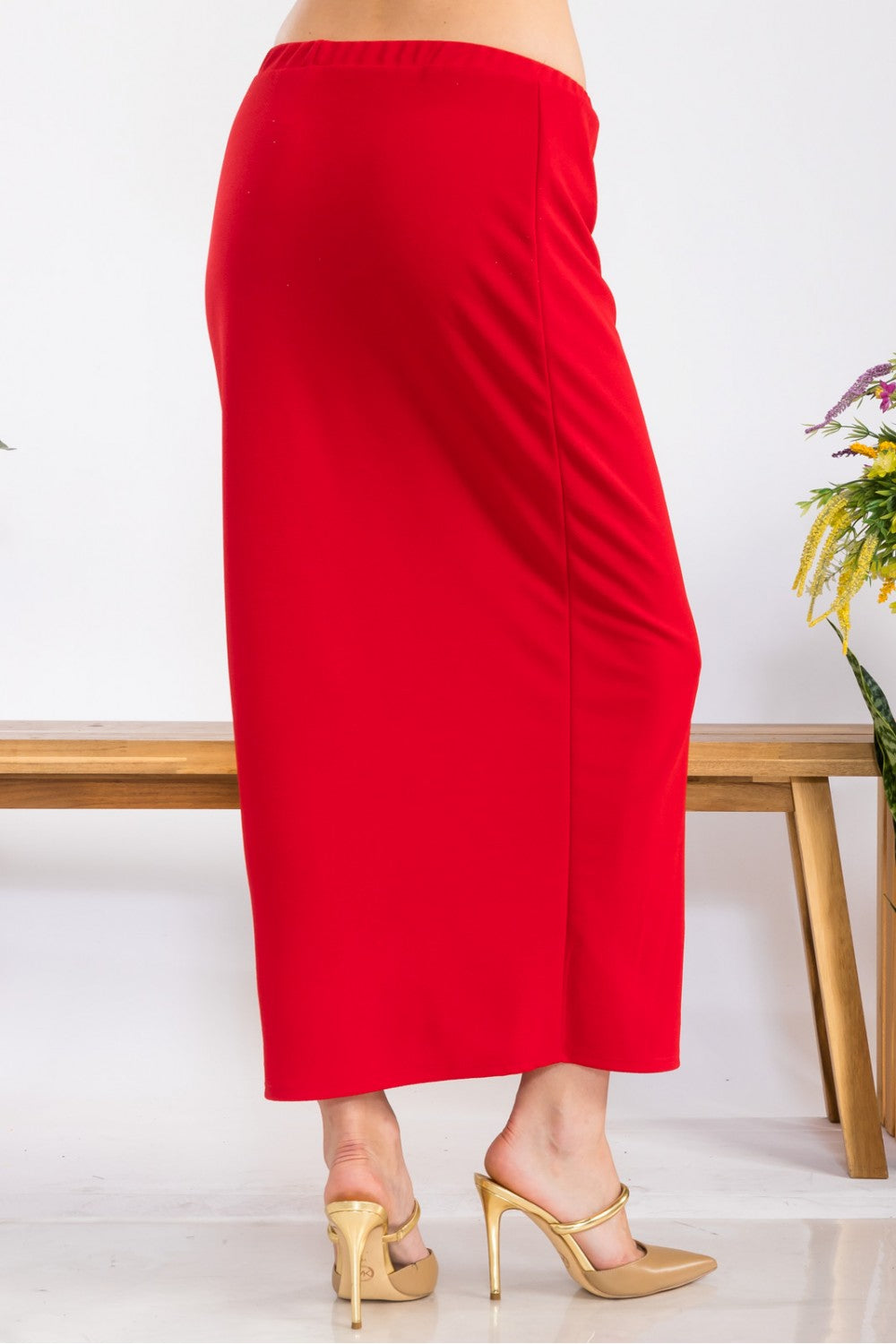 Pink ladies maxi length pencil skirt from Celeste Clothing, showcasing a fitted, elegant design perfect for stylish occasions.