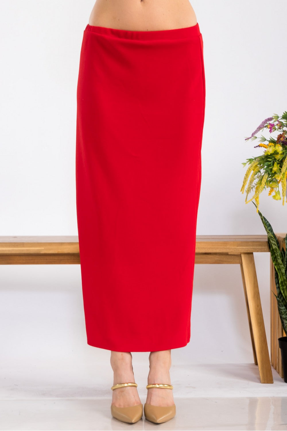 Pink ladies maxi length pencil skirt from Celeste Clothing, featuring a fitted silhouette and elegant style.