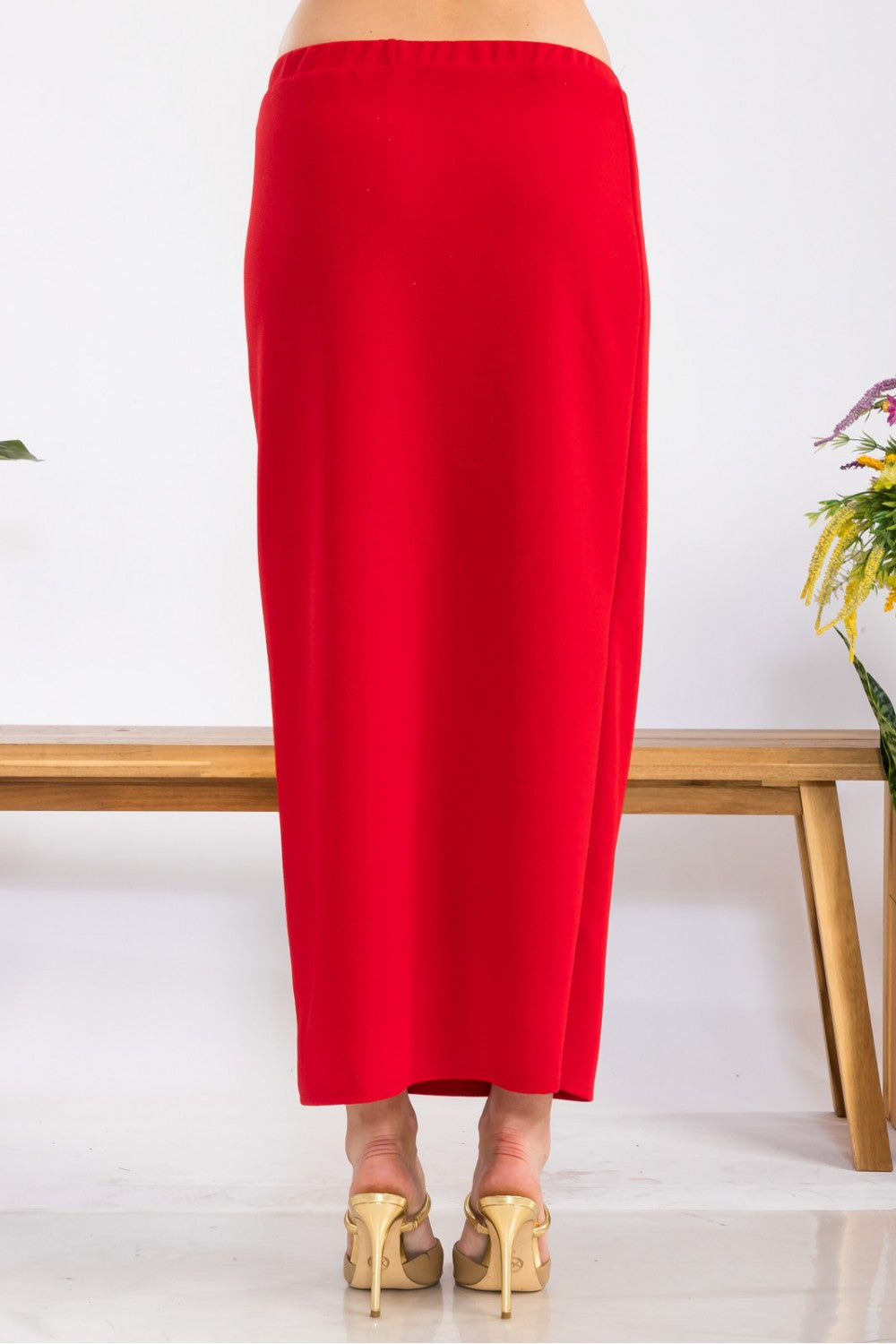 Pink ladies maxi length pencil skirt by Celeste Clothing, shown in small size with a sleek, fitted silhouette.