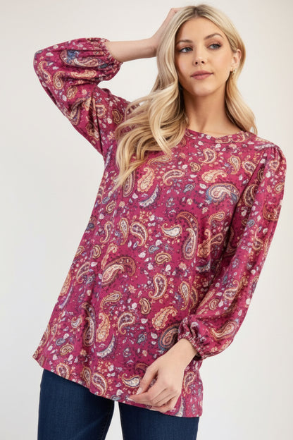 Blue paisley bishop sleeve top from Celeste Clothing, stylish shirt with flowy sleeves and intricate pattern.