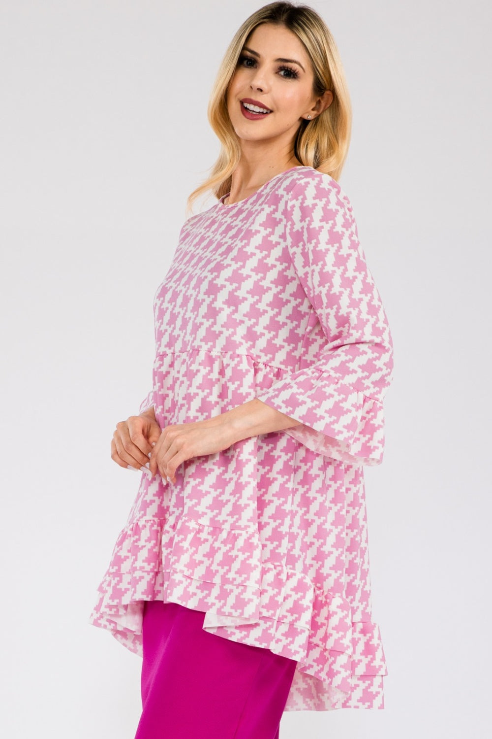 Black Celeste Houndstooth high-low blouse with flounce sleeves and ruffle hem, stylish shirt from Celeste Clothing.