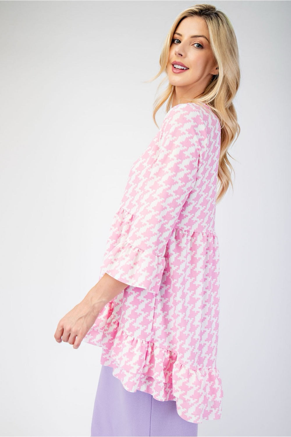 Black Celeste Clothing houndstooth high-low blouse with flounce sleeves and ruffle hem, stylish shirt for casual or dressy wear.