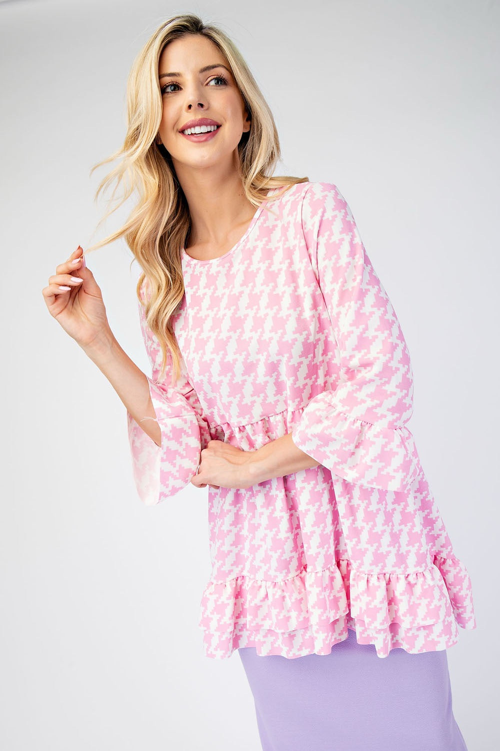 Black Celeste Houndstooth flounce sleeve high-low blouse with ruffle hem, stylish shirt from Celeste Clothing.
