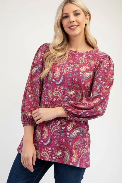 Blue paisley bishop sleeve top from Celeste Clothing, stylish blouse with flowing sleeves and intricate pattern.