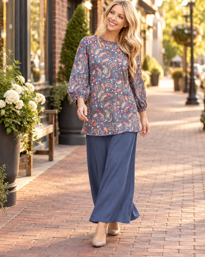 Blue paisley bishop sleeve top from Celeste Clothing, stylish blouse with flowing sleeves and intricate pattern.