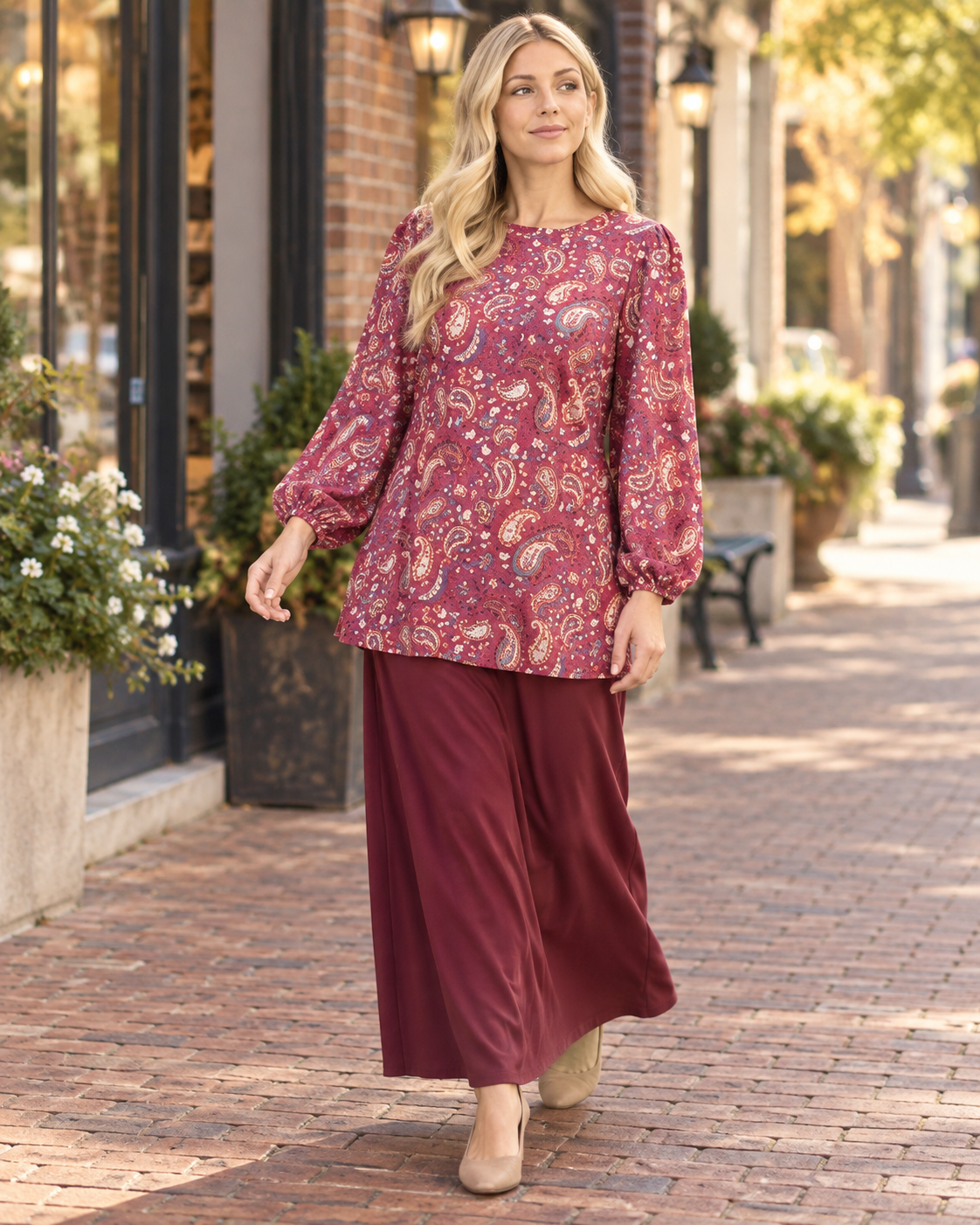 Burgundy paisley bishop sleeve blouse from Celeste Clothing, featuring flowing sleeves and elegant design.