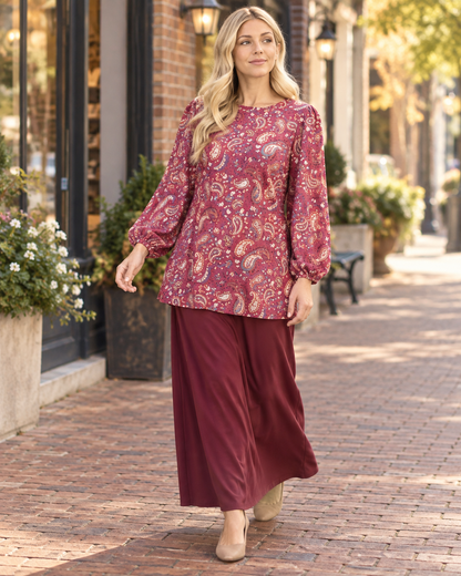 Burgundy paisley bishop sleeve blouse from Celeste Clothing, featuring flowing sleeves and elegant design.