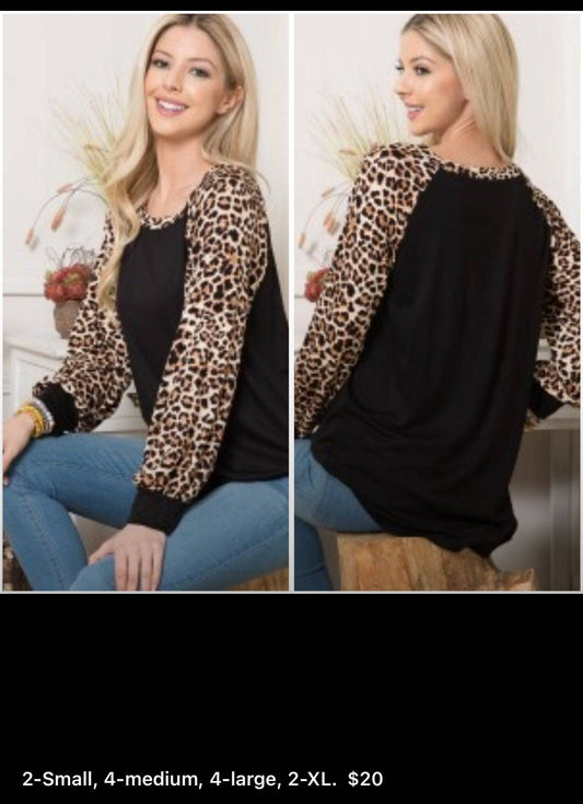 Leopard print long sleeve colorblock top by Celeste Clothing, stylish shirt with bold animal print and colorblocking design.