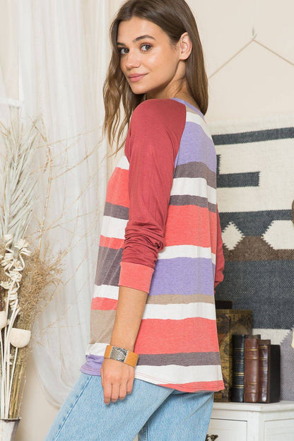 Celeste Contrast Raglan Long Sleeve Top, a stylish shirt with bold stripe contrast, featuring long sleeves and a relaxed fit.