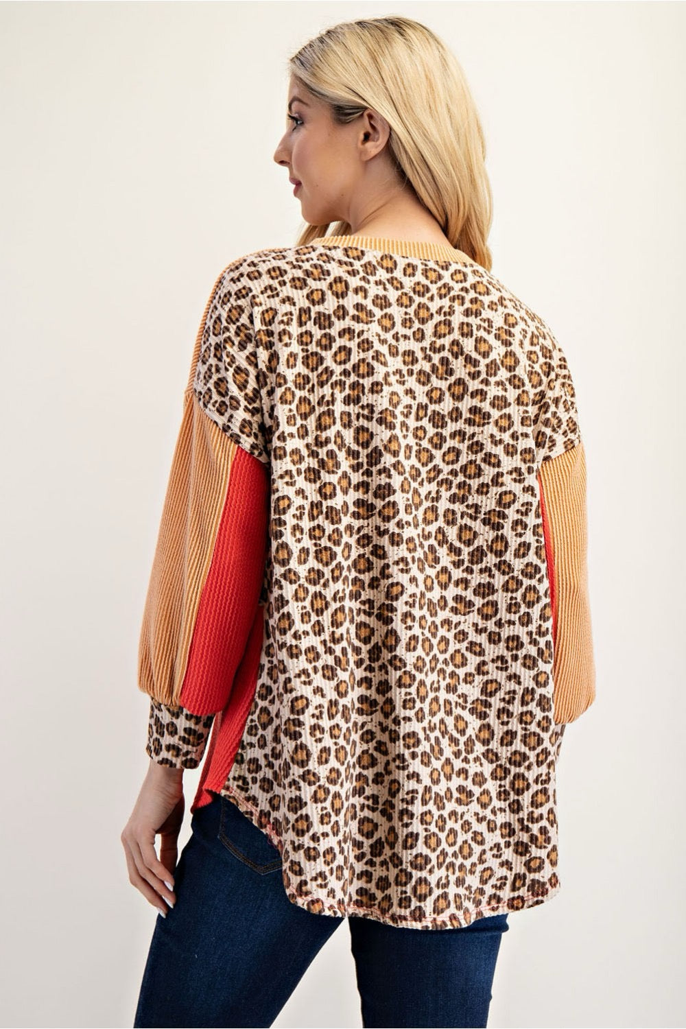 Celeste Clothing Urban Rib Coral and Leopard Top, stylish shirt with vibrant coral and leopard print details.