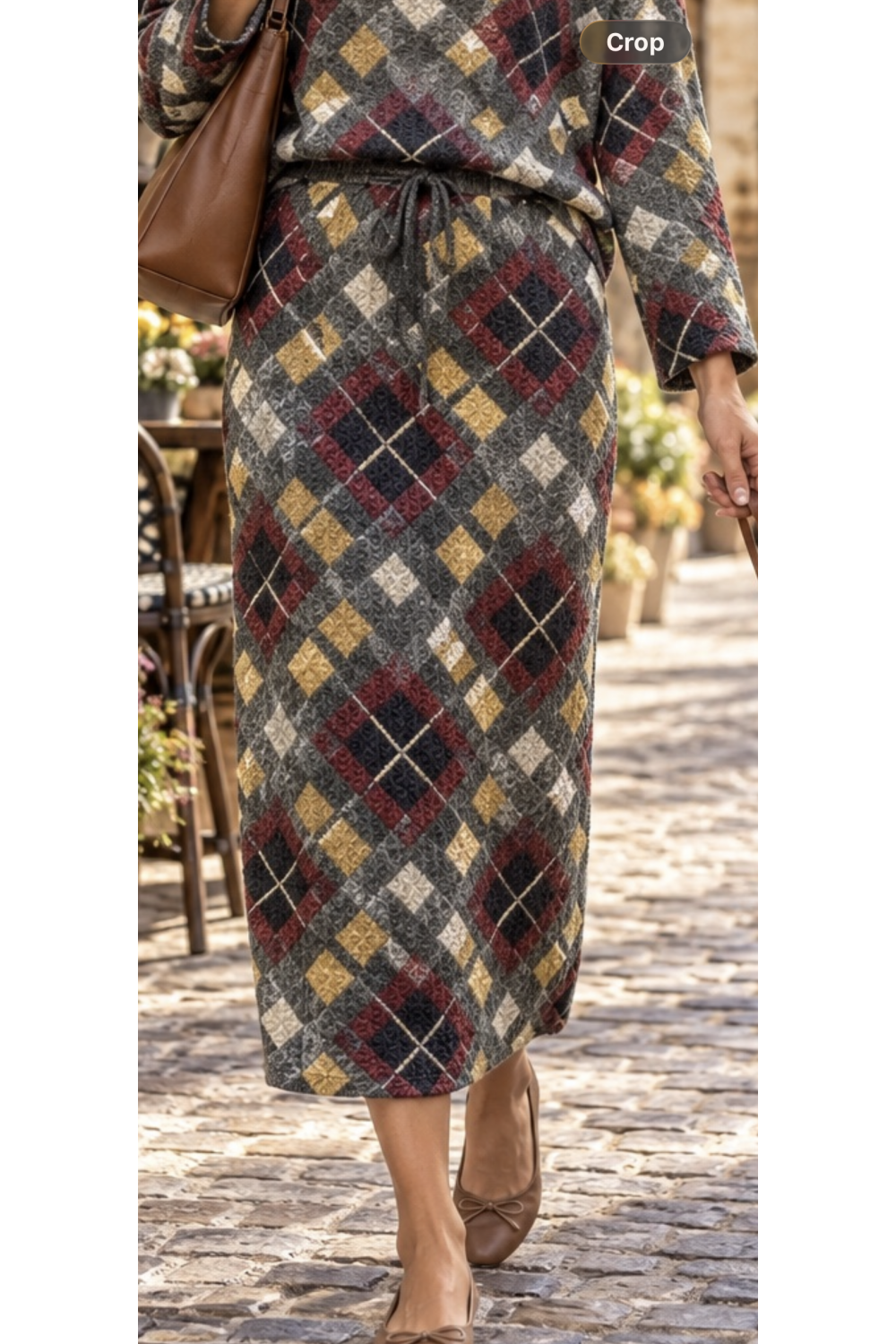 Charcoal burgundy and mustard argyle knit two-piece set with matching long sleeve top and drawstring midi skirt, partial outfit view