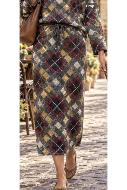 Charcoal burgundy and mustard argyle knit two-piece set with matching long sleeve top and drawstring midi skirt, partial outfit view