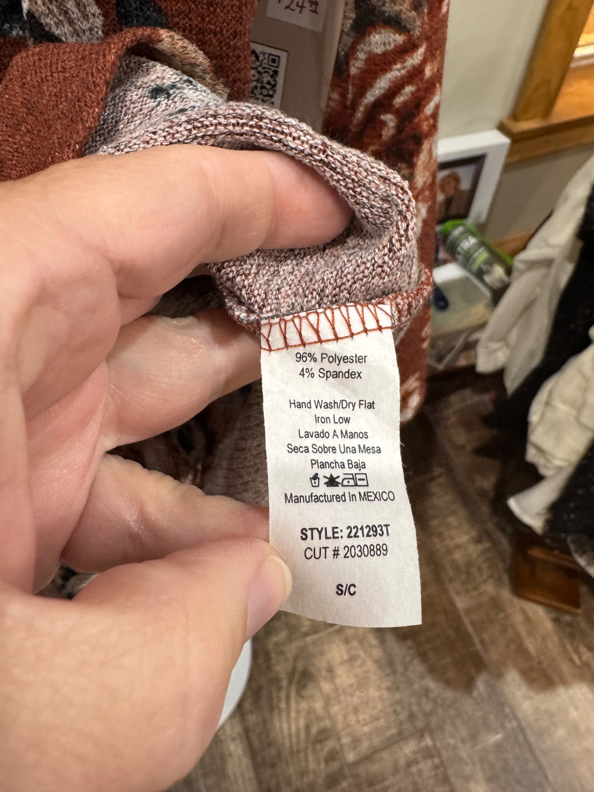 Chris & Carol rust floral cowl-neck top fabric and care tag