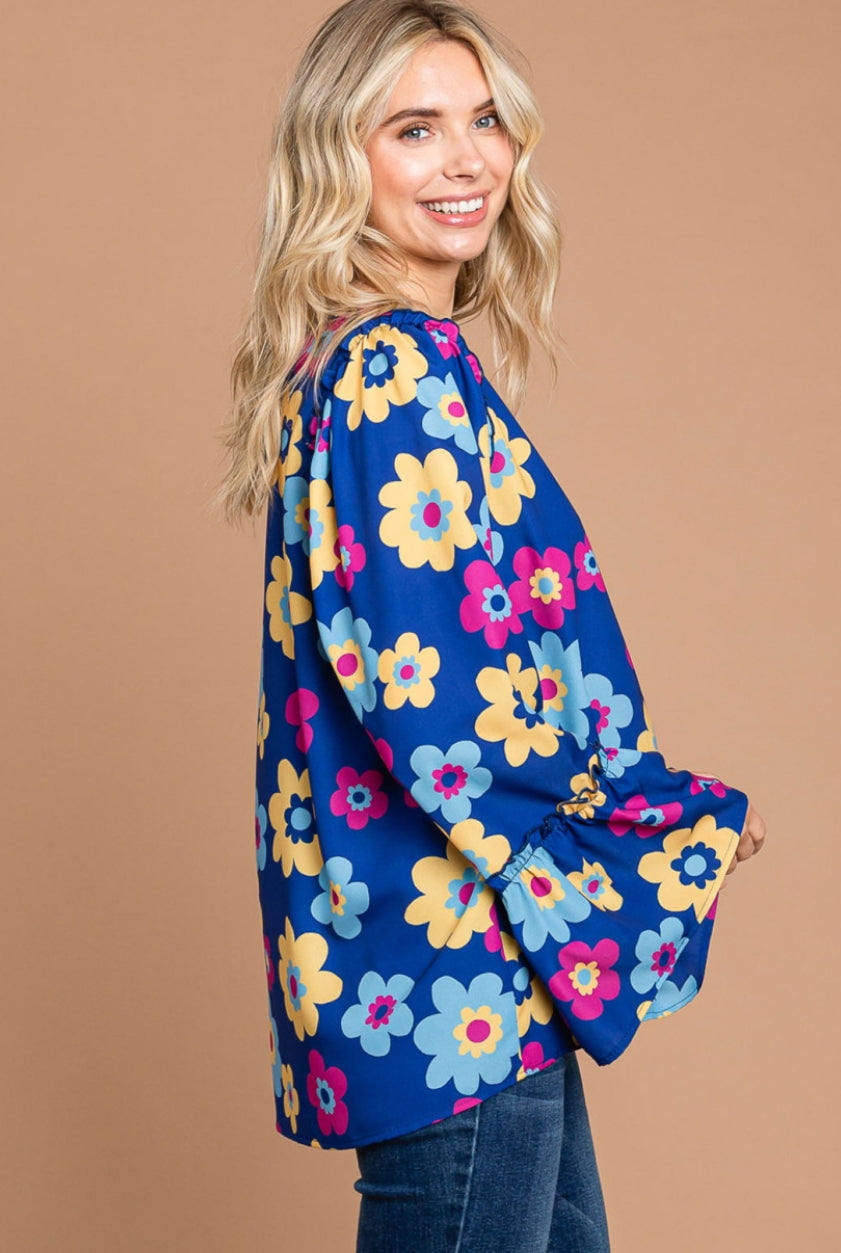 Cotton Bleu women's floral ruffle long sleeve top in multicolor cotton fabric with feminine ruffle details.