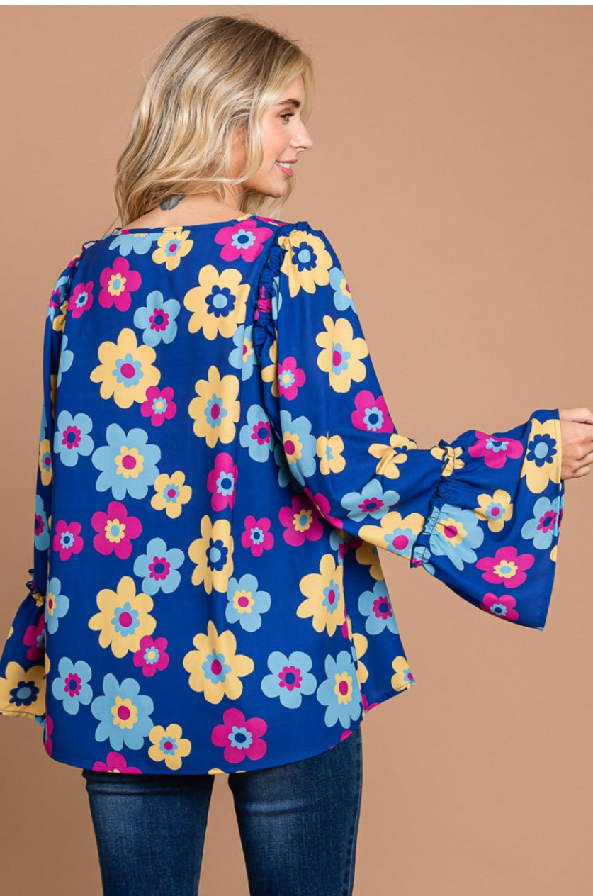 Cotton Bleu women's long sleeve floral ruffle top in multicolor with feminine ruffle details and lightweight cotton fabric.