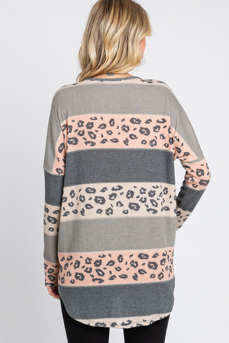 Women's long sleeve tunic by Cream N Sugar with multicolor leopard print and round hem, stylish and comfortable women's top.