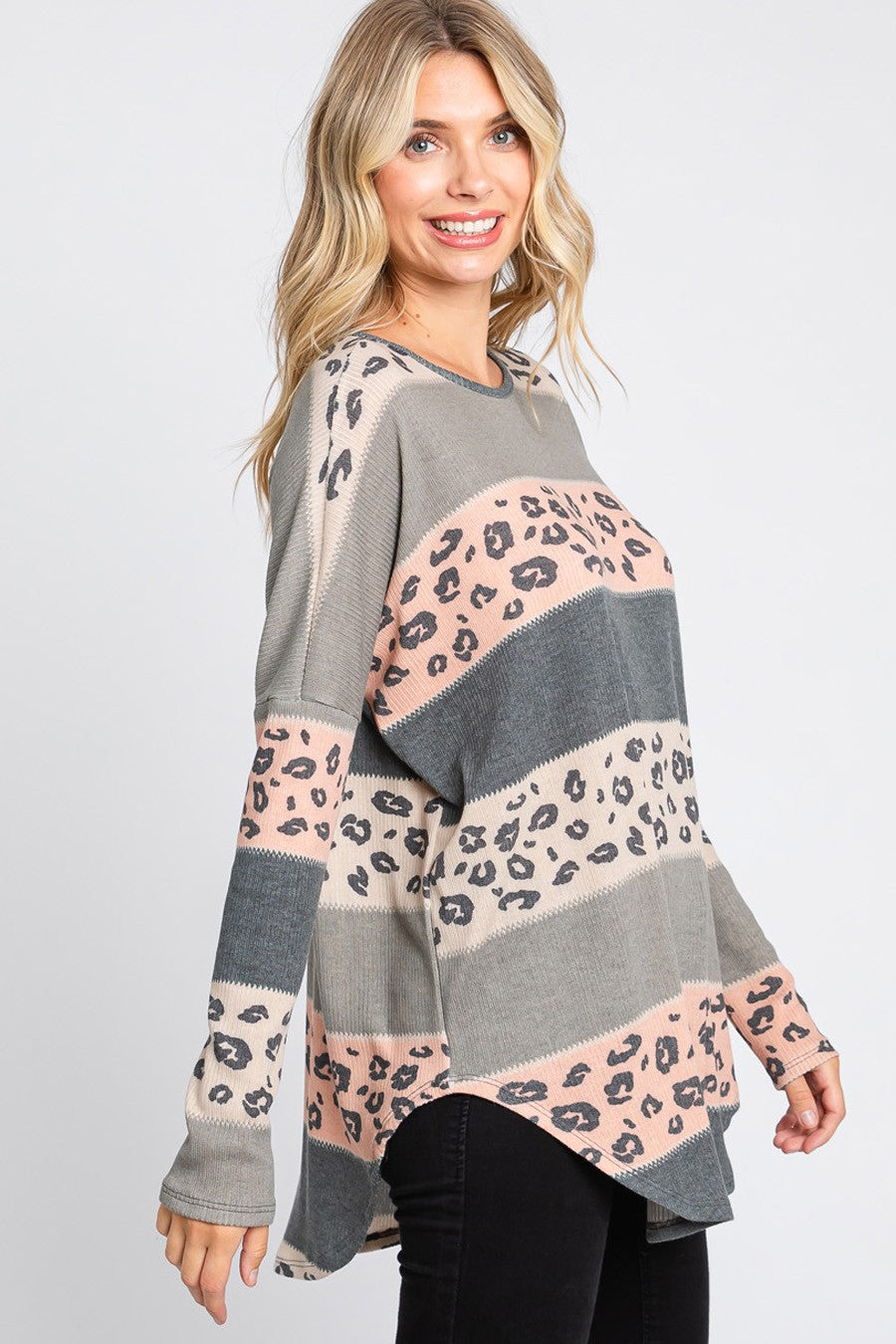 Women's multi-color leopard print long sleeve tunic top with round hem by Cream N Sugar.