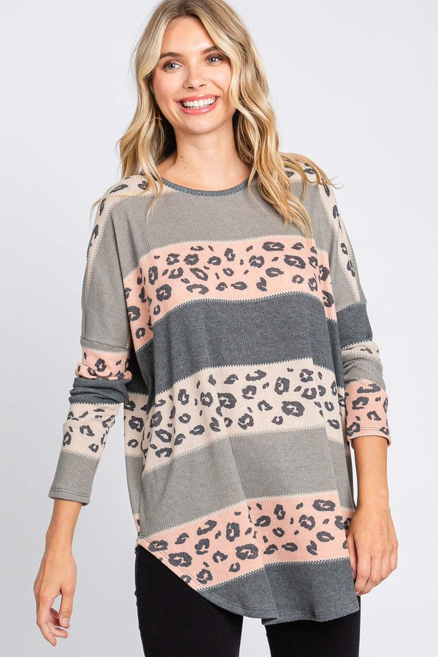 Women's multi-color leopard print long sleeve tunic top by Cream N Sugar with a round hem and relaxed fit.