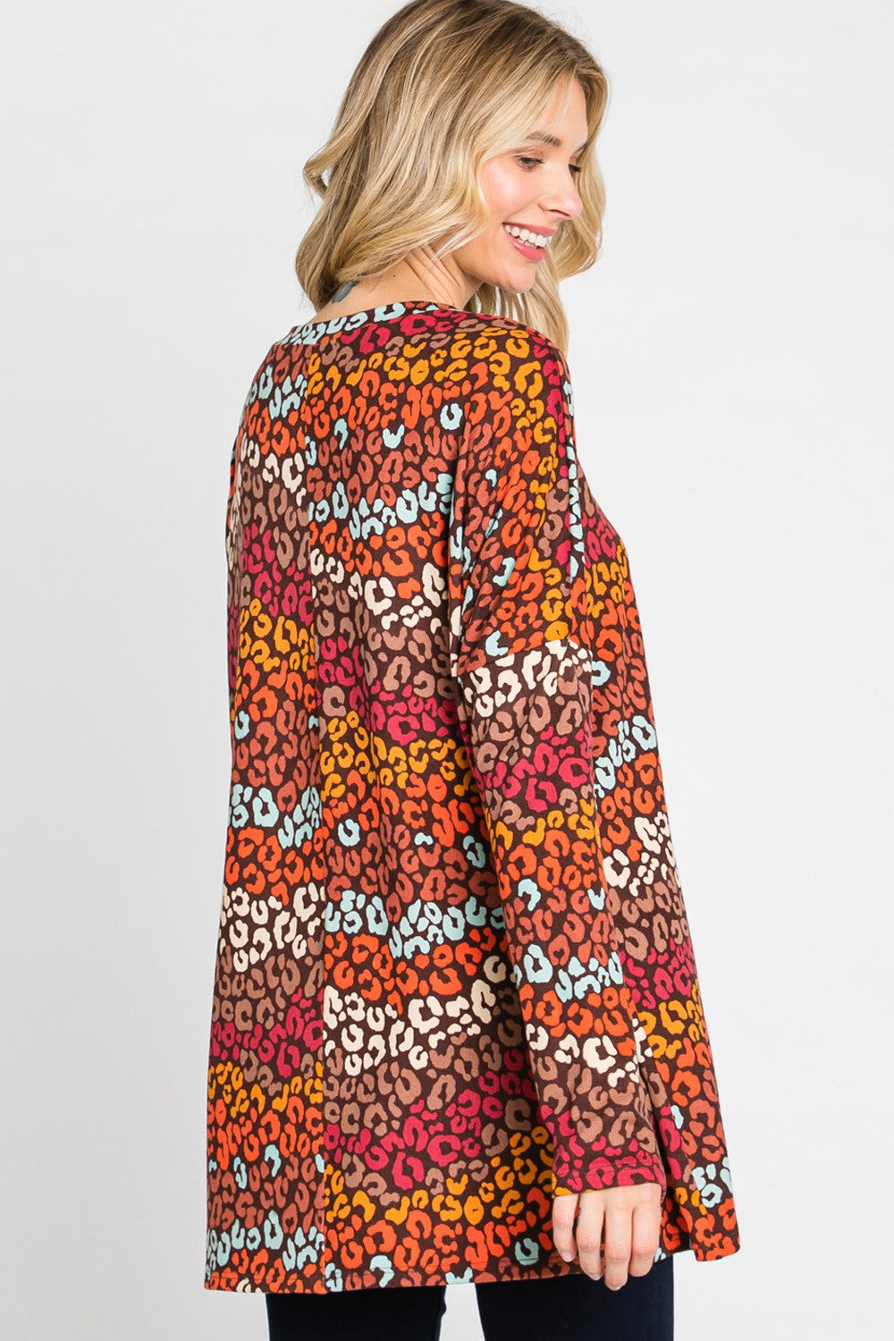 Women's multi-color leopard print long sleeve top by Cream N Sugar, loose fit, stylish animal print design.