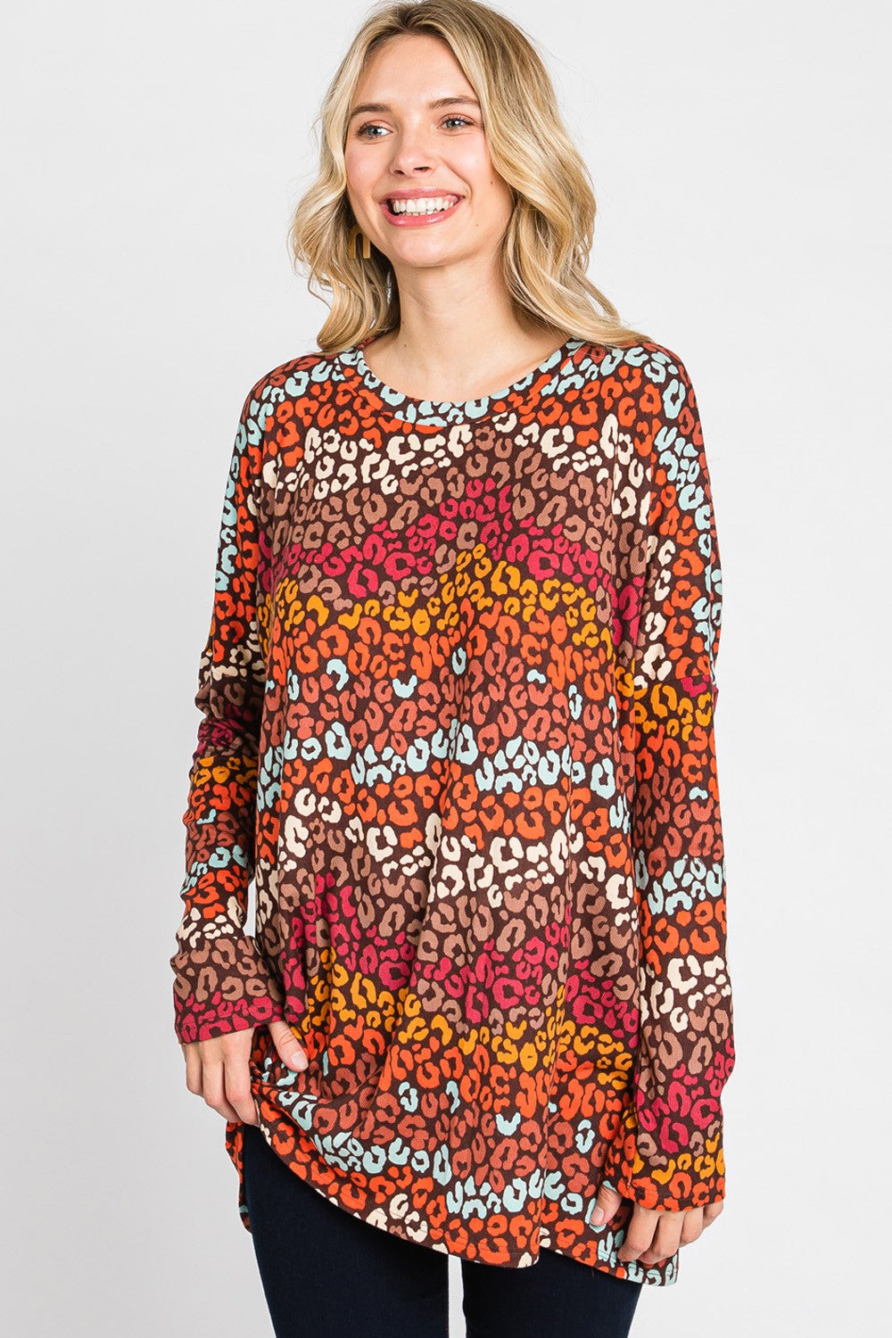 Women's multi-color leopard print long sleeve top by Cream N Sugar with a loose fit and animal print design.