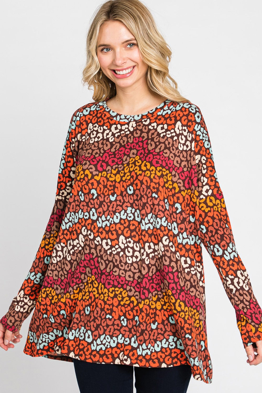 Women's long sleeve loose fit top with multi-color leopard print by Cream N Sugar, featuring a stylish animal print design.