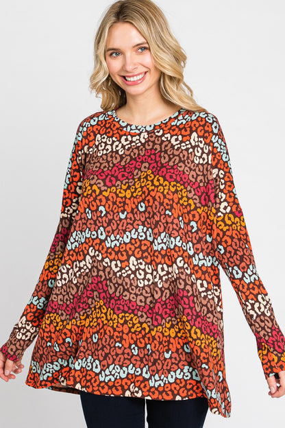 Women's long sleeve loose fit top with multi-color leopard print by Cream N Sugar, featuring a stylish animal print design.