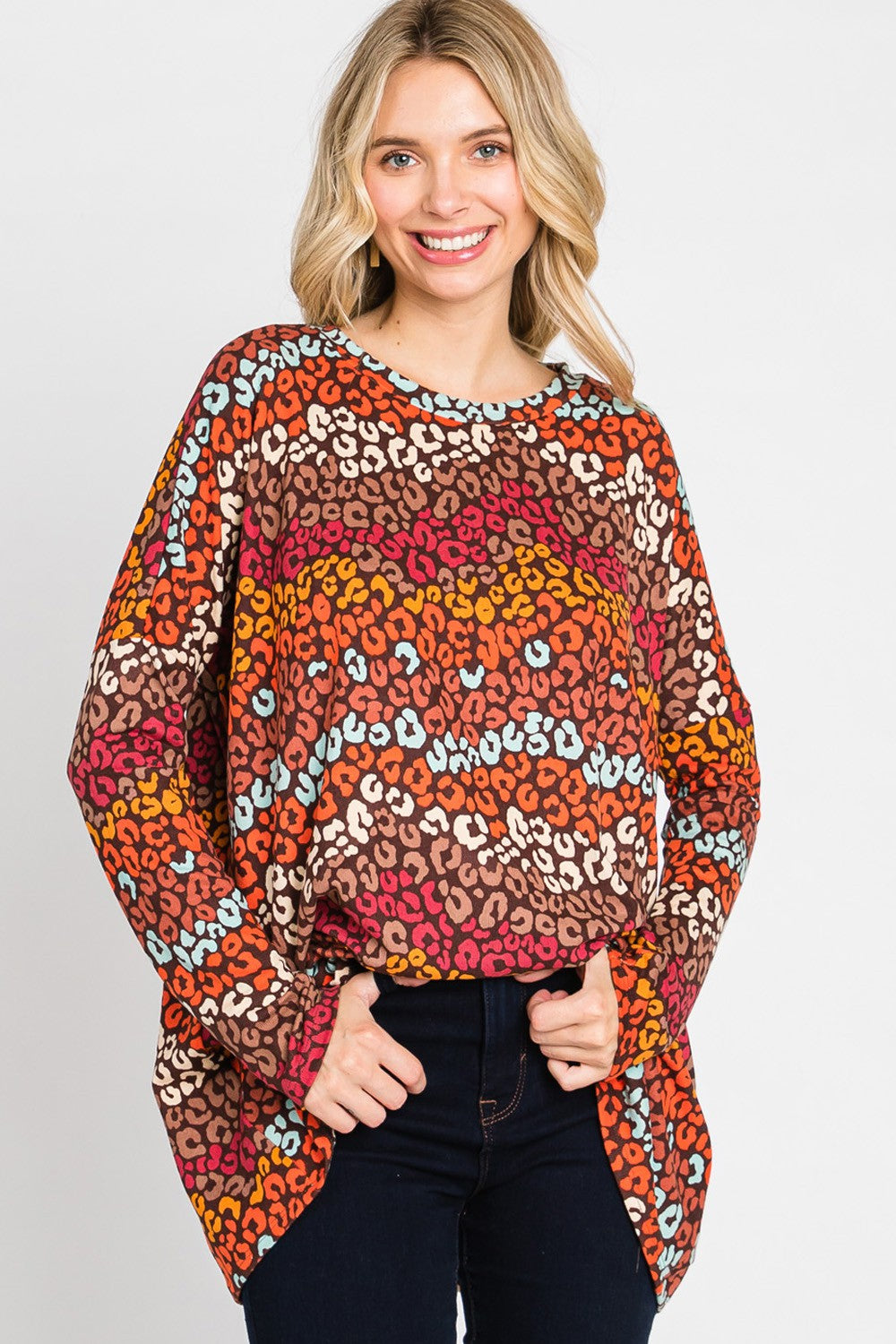 Women's multi-color leopard print long sleeve top by Cream N Sugar, loose fit, casual animal print blouse.