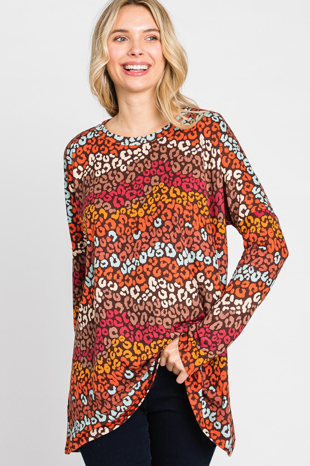 Women's multi-color leopard print long sleeve top by Cream N Sugar, loose fit with a stylish animal print design.