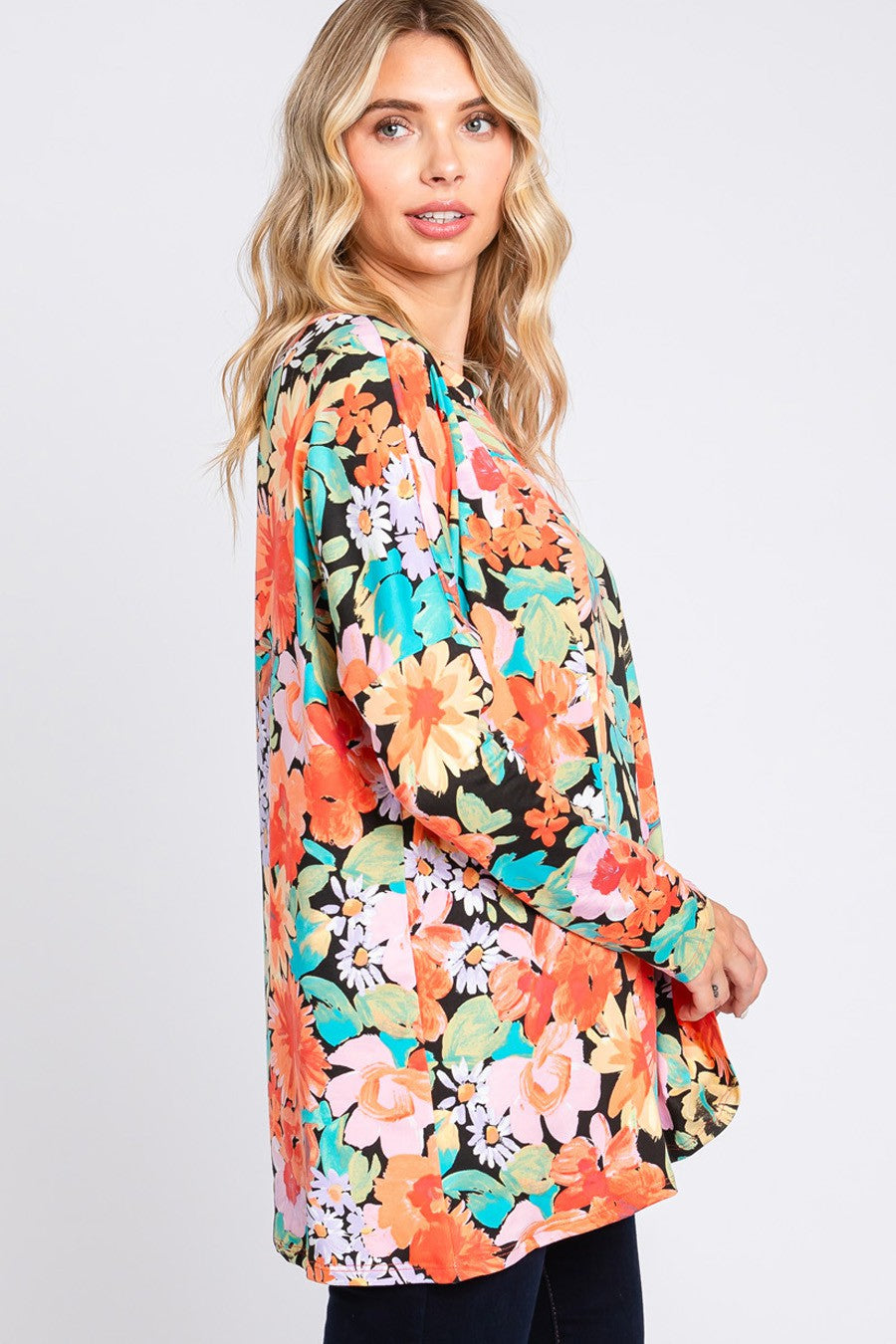 Cream N Sugar floral print long sleeve loose fit top, perfect for casual wear, featuring vibrant floral patterns and comfortable fabric.