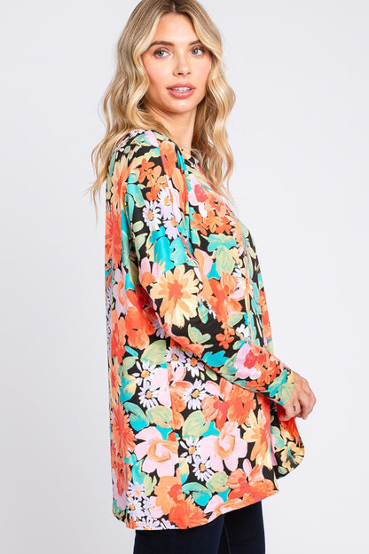 Cream N Sugar floral print long sleeve loose fit top, perfect for casual wear, featuring vibrant floral patterns and comfortable fabric.