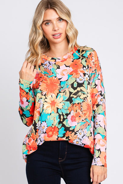 Cream N Sugar floral print long sleeve loose fit top, plus size, with a relaxed fit and vibrant floral pattern.
