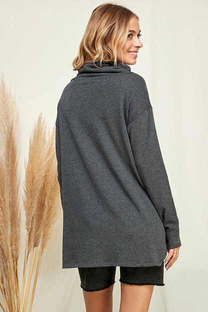 Culture Code high neck long sleeve top with high-low hem in soft white, featuring a stylish and versatile design.