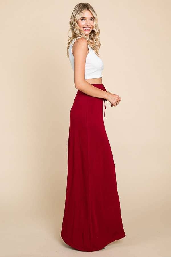 Culture Code ecru draw string flare maxi skirt with a flowing silhouette and elastic waistband, perfect for casual and summer wear.