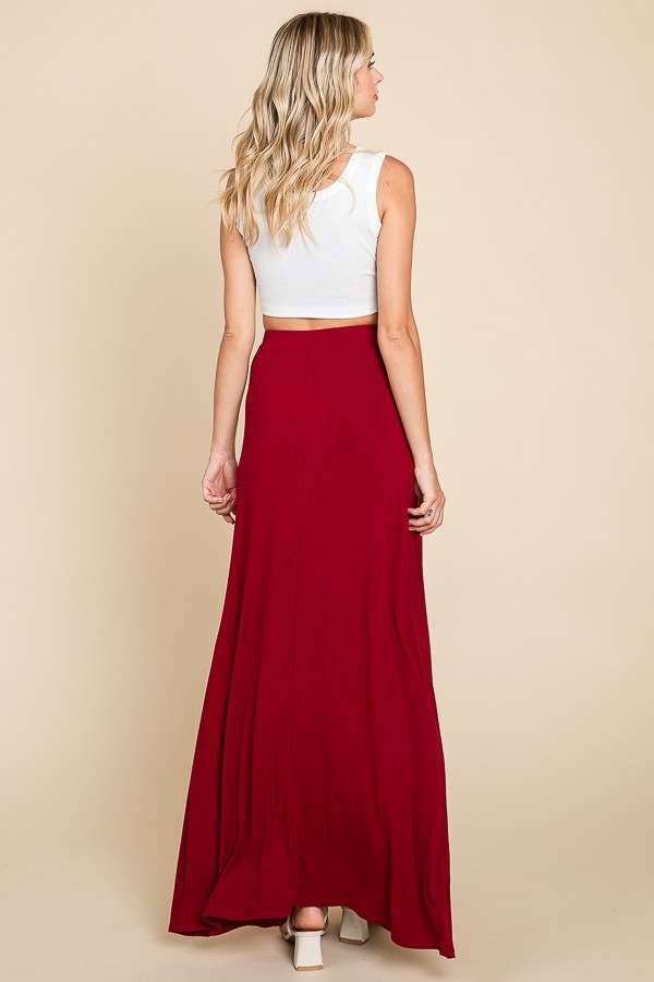 Culture Code drawstring flare maxi skirt in ecru cream with a relaxed fit and flowy silhouette, shown on a model.